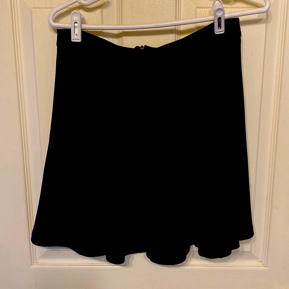 Lush. Large. Black skirt.